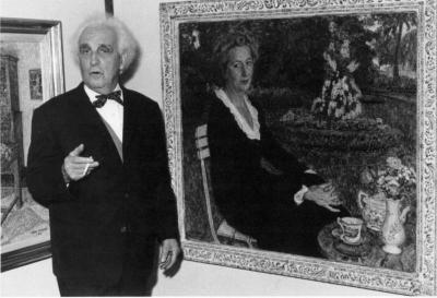 Leon De Smet poseert voor een portret van zijn vrouw Claire